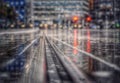 close-up of wet railroad tracks during rainy season