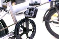 Close up wheel and chain of mountain biking. Landscape view of disc break system and front Derailleur of moutain bike.