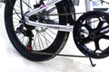 Close up wheel and chain of mountain biking. Landscape view of disc break system and front Derailleur of moutain bike.