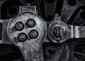 Close up of the wheel and coupling rods of an old steam locomotive with textured metal surface and bolts Royalty Free Stock Photo