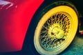 Close-up of wheel details of Vintage Red Car