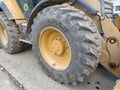 Close-up of a wheel from a grader. Construction, land and road works. Excavator tire. Sremska Mitrovica, Serbia, October 18, 2020 Royalty Free Stock Photo