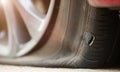 Close up Wheel has big Hole burst and flat tire car Royalty Free Stock Photo