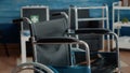 Close up of wheelchair in empty nursing home at clinic. Royalty Free Stock Photo