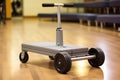 close-up of wheeled, adjustable height exercise step