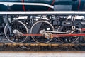 Close-up of wheels of an old retro steam train locomotive Royalty Free Stock Photo