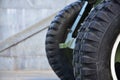 A close-up wheels of a portable weapon of the Soviet Union of World War II, painted in a dark gree