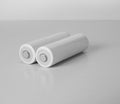 Close up white AA batteries over white background
