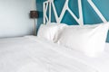 Close up white bedding sheets and pillow in modern bedroom Royalty Free Stock Photo