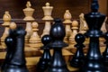 Close up white and black chess figurines on a chess board Royalty Free Stock Photo