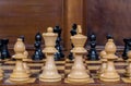 Close up white and black chess figurines on a chess board Royalty Free Stock Photo