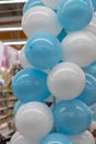 Close up of white and blue balloons. Royalty Free Stock Photo