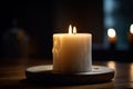 close-up of white candle with crackling flame, casting warm and inviting light