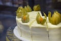 Close-up of a white carrot cake with physalis Royalty Free Stock Photo