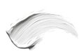 Close-up of white cream-colored brush stroke on plain isolated background. Slightly tilted to right, creating dynamic fluid Royalty Free Stock Photo