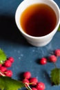 Top view teacup and hawthorn berries Royalty Free Stock Photo