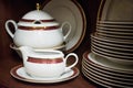 Close up white decorated china teaset and plates