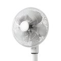 Close-Up of a White Desk Fan with Circular Blades Protected by Mesh Grill Angled Upwards on Plain White Background Royalty Free Stock Photo