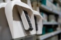 Close up of white dustpan and brush cleaning set on store shelf Royalty Free Stock Photo