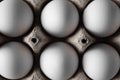 Close-up of white eggs in an egg carton Royalty Free Stock Photo