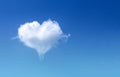 White fluffy heart shaped cloud patterns soft focus on clear blue sky  and copy space , Valentines day background Royalty Free Stock Photo