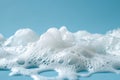 Close-up of white foam against a blue background Royalty Free Stock Photo