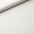 A close-up of a white folded paper sheet with a smooth texture is shown. The angle at Royalty Free Stock Photo