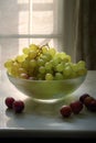 Close up of white grapes in bowl in kitchen, created using generative ai technology Royalty Free Stock Photo