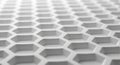 Close-up of a white honeycomb pattern with shallow depth of field Royalty Free Stock Photo