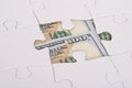 American Banknote Hidden Under Jigsaw Royalty Free Stock Photo