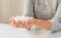 Close up of white lump sugar in woman hands Royalty Free Stock Photo