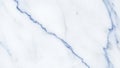 Close-up of White Marble Surface with Delicate Blue Veins and Natural Stone Texture Royalty Free Stock Photo