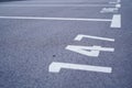 Close-up of white paint markings on parking lot.Empty car parking, Car parking lot with white mark, Parking lane outdoor in public