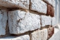 Close-up of white painted bricks forming a wall, highlighting texture and depth of field Royalty Free Stock Photo