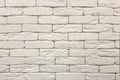 Close-up of white painted whitewashed solid brick wall. Abstract copy space background, Bricklaying, construction and masonry