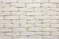 Close-up of white painted whitewashed solid brick wall. Abstract copy space background, Bricklaying, construction and masonry