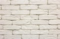 Close-up of white painted whitewashed solid brick wall. Abstract copy space background, Bricklaying, construction and masonry