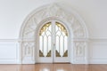 close-up on a white paneled door with an intricate fanlight Royalty Free Stock Photo