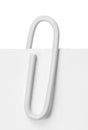 Close up of a white paper clip