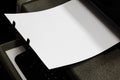 Close-up white paper sheets on the printer in office Royalty Free Stock Photo