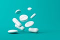 Close up of white pills or aspirin tablets on green background with pharmacy and medical concept. White capsule or drugs. 3D Royalty Free Stock Photo