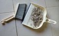 close up a white plastic whisk broom and dustpan indoors.concept Household hygiene Royalty Free Stock Photo