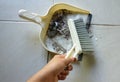 close up a white plastic whisk broom and dustpan indoors.concept Household hygiene Royalty Free Stock Photo