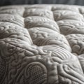 Close up of a white quilted upholstery pillows