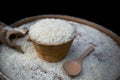 Close up of white rice on wooden basket.