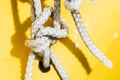 Close up on a white rope knot on a boat