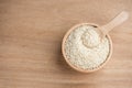 Close up of white sesame seed on wooden bowl in kitchen Royalty Free Stock Photo