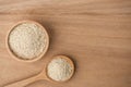 Close up of white sesame seed on wooden spoon in kitchen Royalty Free Stock Photo