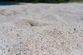 Close up of white silica sand. Summer beach holiday nature texture