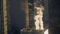 CLOSE UP: White smoke comes rolling out of building vents in New York City. Royalty Free Stock Photo